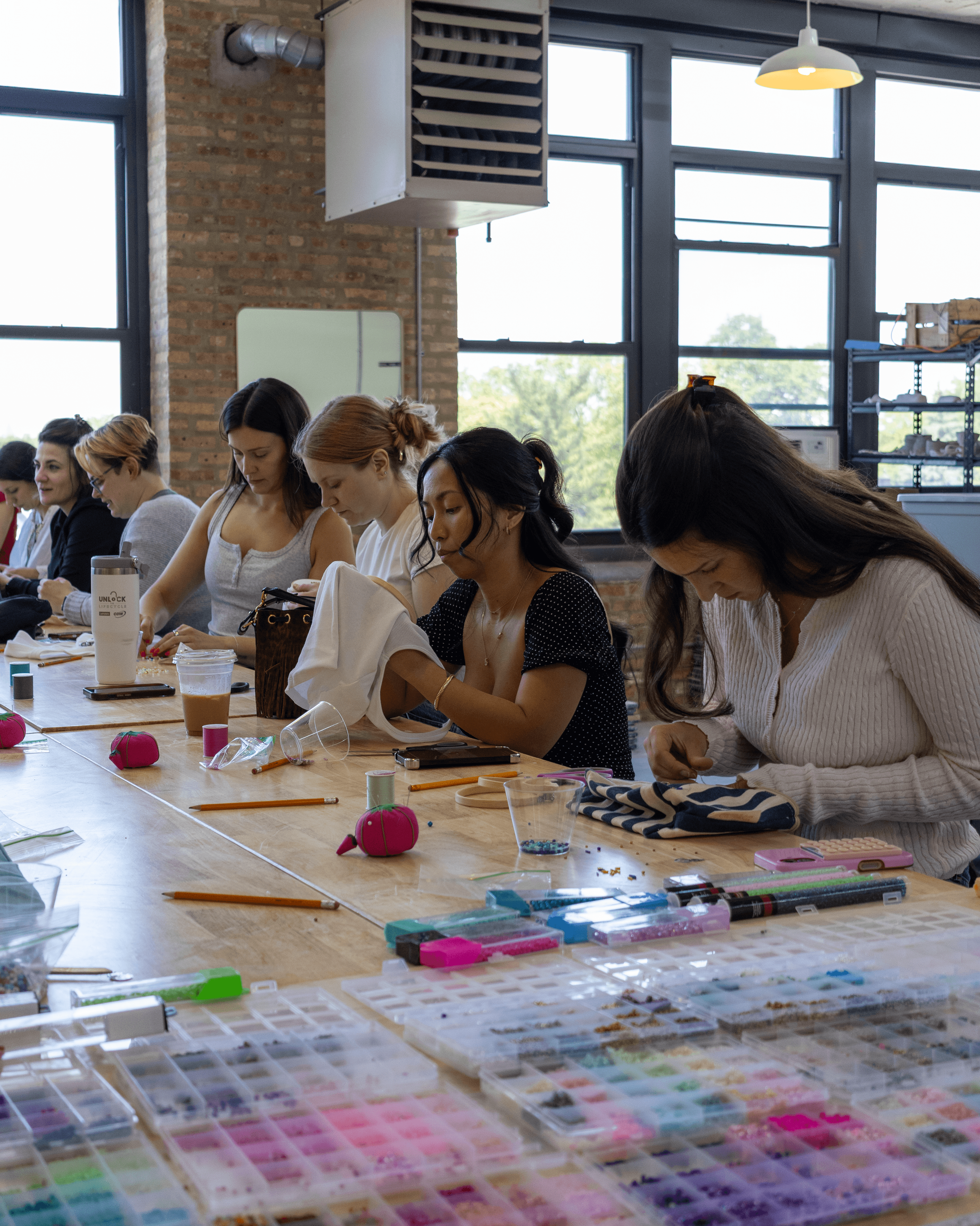 Workshop participants working side by side at Mixed Mediums studio