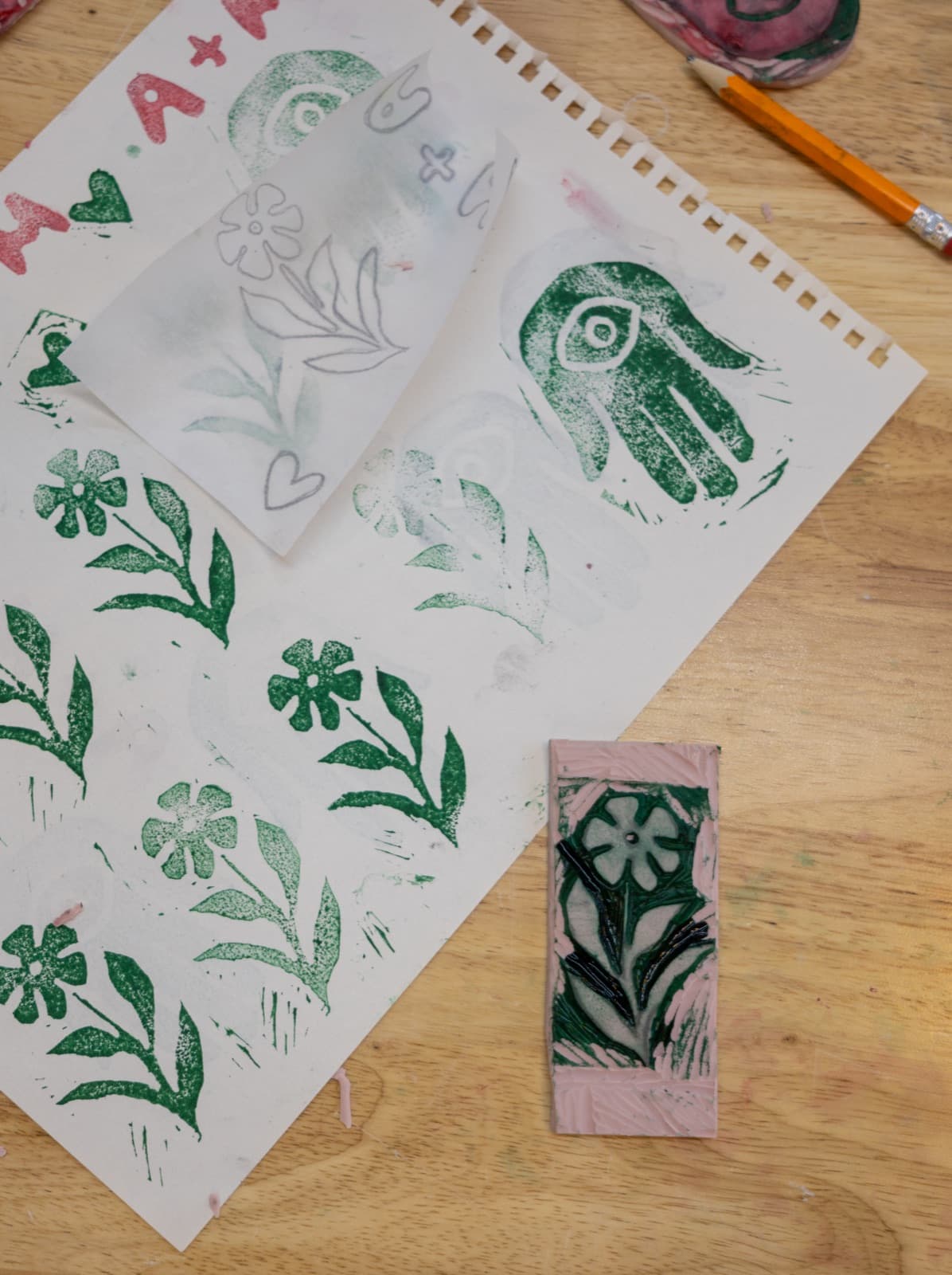 Finished linocut stamps and their printed designs