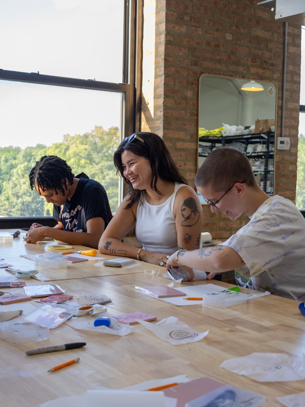 Group carving linocut stamps at a Mixed Mediums workshop in Chicago