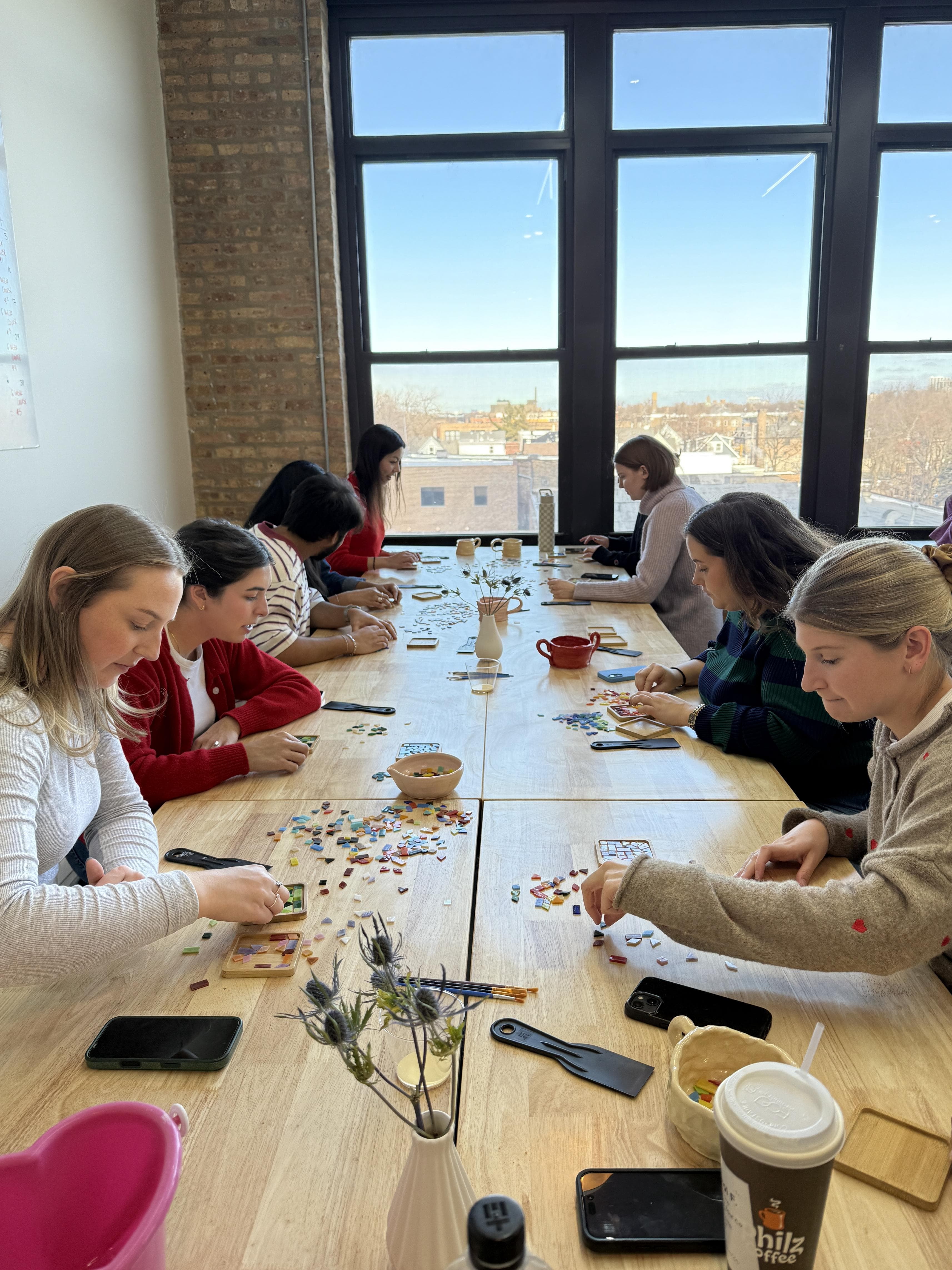 Workshop participants arranging tiles